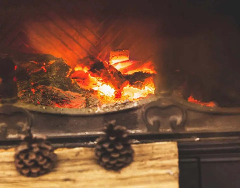 Cozy fireplace with burning wood